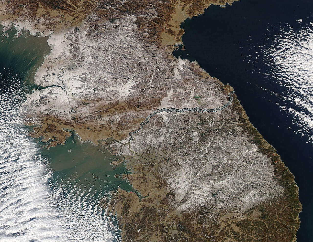 A winter storm brought cold air and snow to the Korean Peninsula on December 13-
